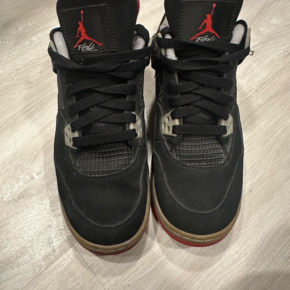Jordan Black and Red Sneakers with Air Cushioning